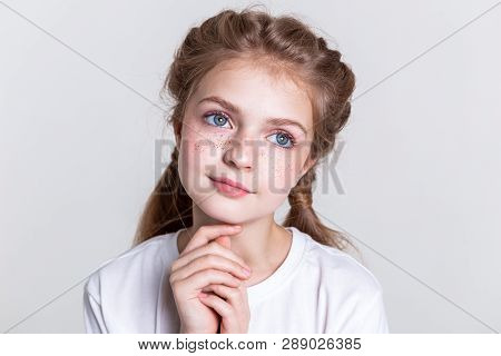 Pleasant Sinless Little Child Looking Up With Her Big Eyes