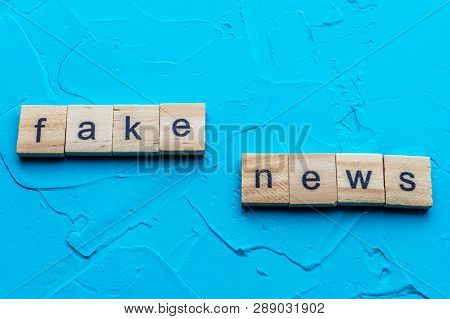 Inscription On A Blue Background Fake News. Concept