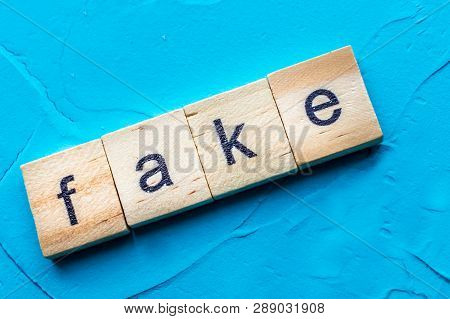 Inscription On A Blue Background Fake News. Concept