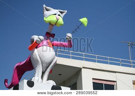 Limassol, Cyprus, March 10th, 2019: Close-up Of A Big Funny Cat Doll On A Float Moving Along Archbis