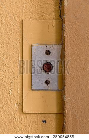 Old Elevator Call Button With Grungy Pattern In A Soviet Building In Post-soviet Riga, Latvia