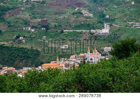 Faraya Valley And Village With Scattered Houses Shot From The Hill. Lebanon
