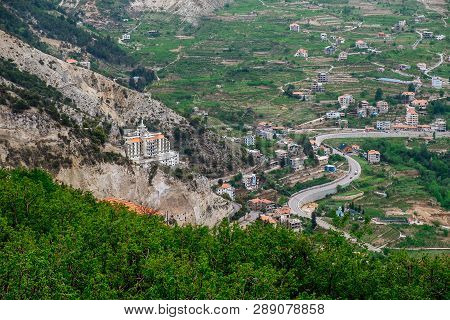 Faraya Valley And Village With Scattered Houses Shot From The Hill. Lebanon