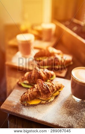 Fresh Croissant And Original Authors Coffee On Beet Milk With Fruits On Wooden Plate On Table. Healt