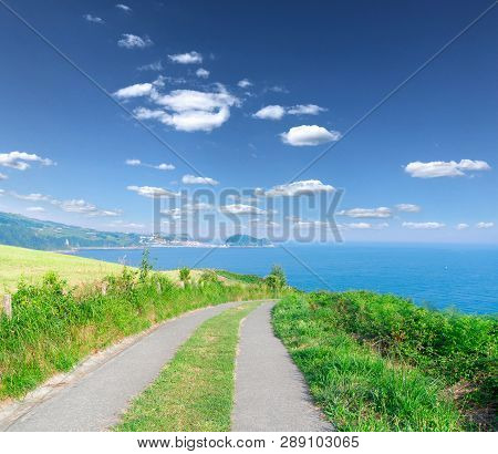 Road Leading To The Beach Of Zarauz At Sunny Summer Day, Pais Vasco, Spain