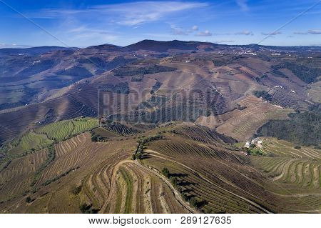 Aerial View Of The Terraced Vineyards In The Douro Valley Near The Village Of Pinhao, Portugal; Conc