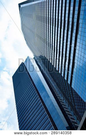 Commercial building in business disctrict of Singapore at noon
