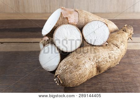 Raw Yucca Starch On The Wooden Table - Manihot Esculenta