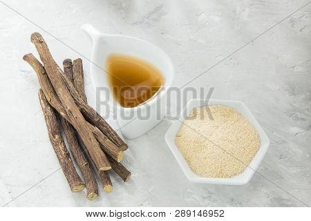 Licorice Tea, Powder And Roots On The Table