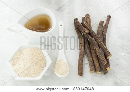 Licorice Tea, Powder And Roots On The Table