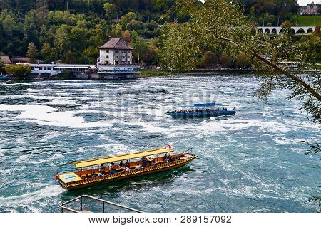 Rhine, Switzerland - September 19, 2018: Tourist Ship On The Rhine River Near The Rhine Falls In Swi