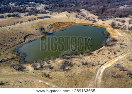 Topdown view from drone on a small lake.