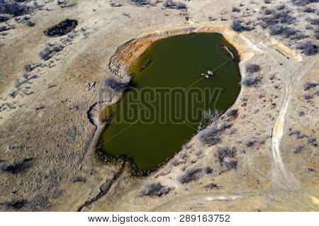 Topdown view from drone on a small lake.