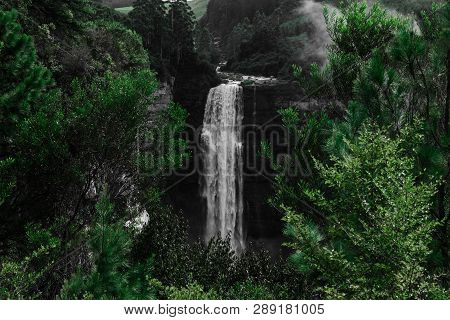 Magical Hidden Waterfall On A Misty Morning.