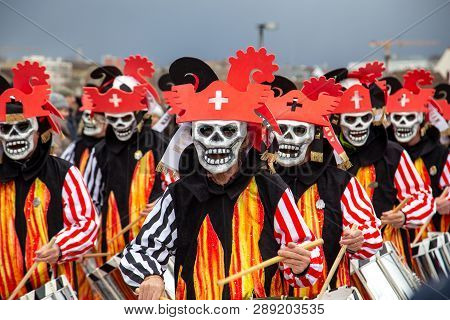 Basel, Switzerland - March 11, 2019: Participants At The Parade Of The Carnival Of Basel 2019. The C