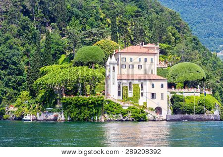 Lake Como, Italy - June 15, 2012: Summer Lake Shore View From Ship Board. Villa Del Balbianello.