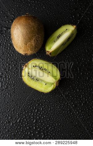 Kiwi Fruit Isolated On Black Background, Fresh Kiwi Fruit. Summer Vitamine Fruit. Healthy Food Or De