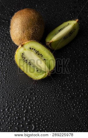 Kiwi Fruit Isolated On Black Background, Fresh Kiwi Fruit. Summer Vitamine Fruit. Healthy Food Or De