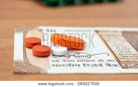 Concept Of The Affordable Medicine In India Due To Generic Drugs On Indian Currency Notes As Backgro