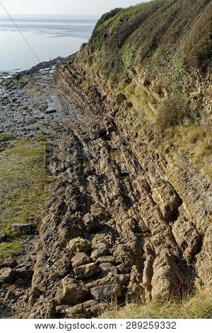 Steep Rock Strata At Battery Point, Portishead, North Somerset, Uk 
Low Tide On A Very Calm Winter D