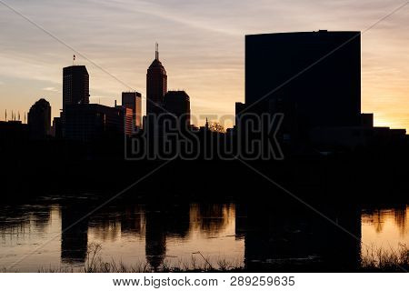 Indianapolis: Circa March 2019: Sunrise Silhouette Of The Indy Downtown Skyline Including The Salesf