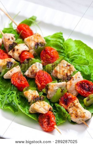 still life of meat skewers