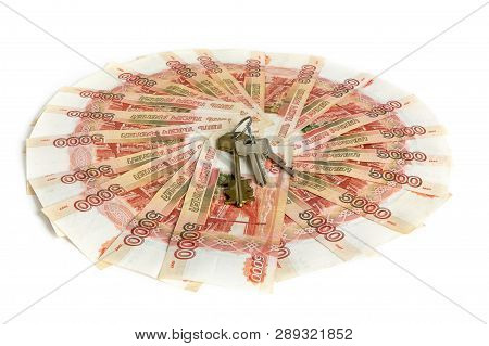 Cash On White Background. The Keys To The Apartment, The House On The Money. Bills 5 Thousand Rubles