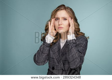 Health And Pain. Stressed Exhausted Young Woman Having Strong Tension Headache. Closeup Portrait Of 