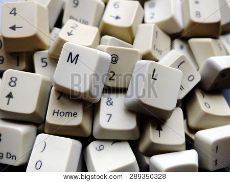 White Computer Keyboard Keys, Mostly Numeric With Ml (machine Learning) Buttons At The Front. Concep