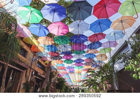 Colorful Umbrellas Street Decoration On Shopping Alley In Nicosia, Northern Cyprus. Sunny Day.