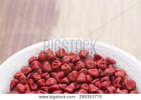 Annatto Beans In Bowl On The Table Seen From Up Close