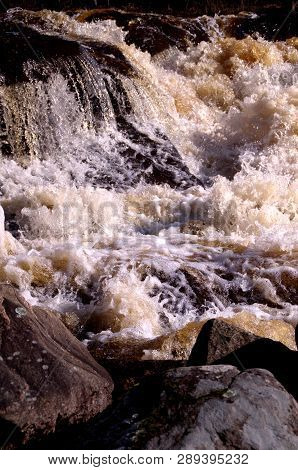 Beautiful Sparkling And Splashing Waterfall, Whitewater In Springtime.