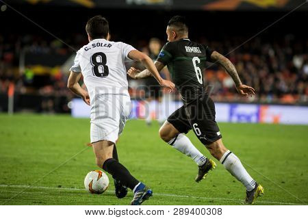 VALENCIA, SPAIN - MARCH 7:(8) Soler, (6) Ramirez during UEFA Europa League match between Valencia CF and FC Krasnodar at Mestalla Stadium on March 7, 2019 in Valencia, Spain