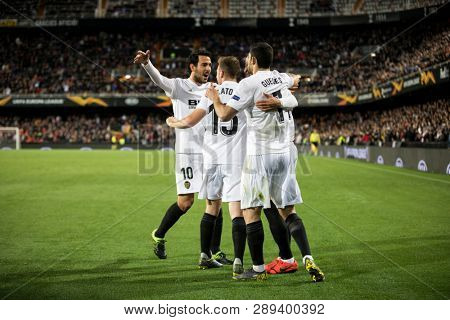 VALENCIA, SPAIN - MARCH 7: Valencia players celebrate a goal during UEFA Europa League match between Valencia CF and FC Krasnodar at Mestalla Stadium on March 7, 2019 in Valencia, Spain