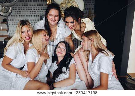 Beautiful And Positive Bide Mades Having Fun On Hen Party.