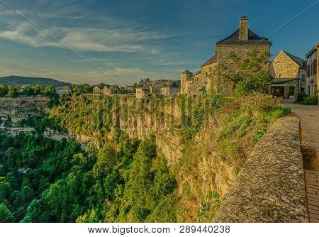 Bozouls, Midi Pyrenees, France - September 21, 2017: View Of The Houses At The Edge Of The Canyon In