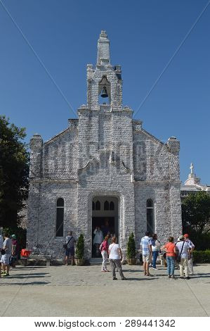 Hermitage Of San Sebastian Decked In Its Totality Of Scallop Shells On Toja Island. Nature, Architec