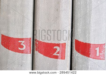 A Few Old Books In A Light Cover Stack On A Table Close-up Design Blank For The Project