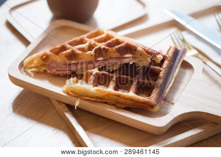 Grilled Waffles With Bacon On Wooden Tray, Close Up