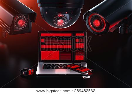 Data Leakage Concept. Three Different Cctv Camera Is Spying On A Computer Checking For Sensitive Dat