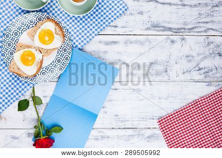 Flowers, Two Cups Of Aromatic Coffee And Heart-shaped Toasts For A Romantic Morning Of Lovers. Red R