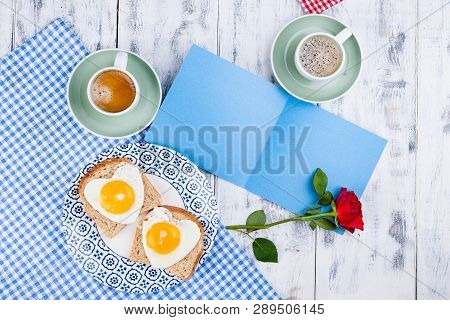 Flowers, Two Cups Of Aromatic Coffee And Heart-shaped Toasts For A Romantic Morning Of Lovers. Red R