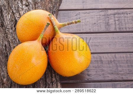 Passion Fruit Granadilla On The Table - Passiflora Ligularis