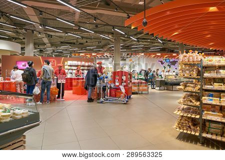 ZURICH, SWITZERLAND - CIRCA OCTOBER, 2018: interior shot of Migros supermarket in Zurich International Airport. Migros is Switzerland's largest retail company.