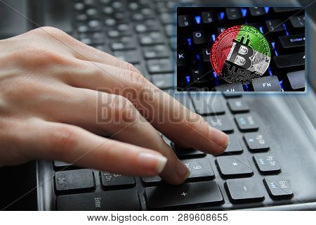 Hand Of The Girl On The Keyboard Close Up With The Concept Of Digital Technology On The Purchase And