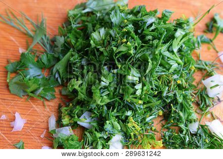 Chopped Parsley On Wooden Board For Salad Cooking