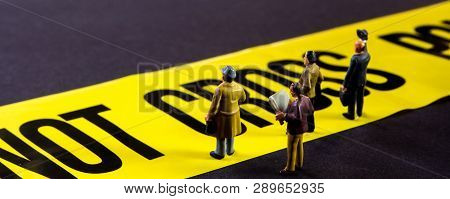 Do Not Cross Line With Little Miniature Figurines Standing In Front Of The Tittle And Looking At It,