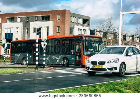 Papendrecht Netherlands March 12, 2019 View Of A Classic Dutch City Bus Rolling In The Streets Of Pa