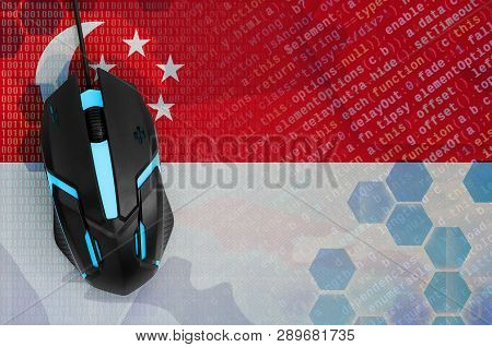 Singapore Flag  And Computer Mouse. Digital Threat, Illegal Actions On The Internet