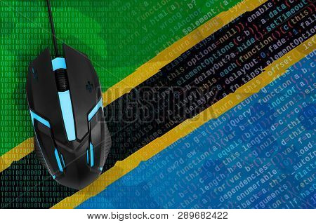 Tanzania Flag  And Computer Mouse. Digital Threat, Illegal Actions On The Internet